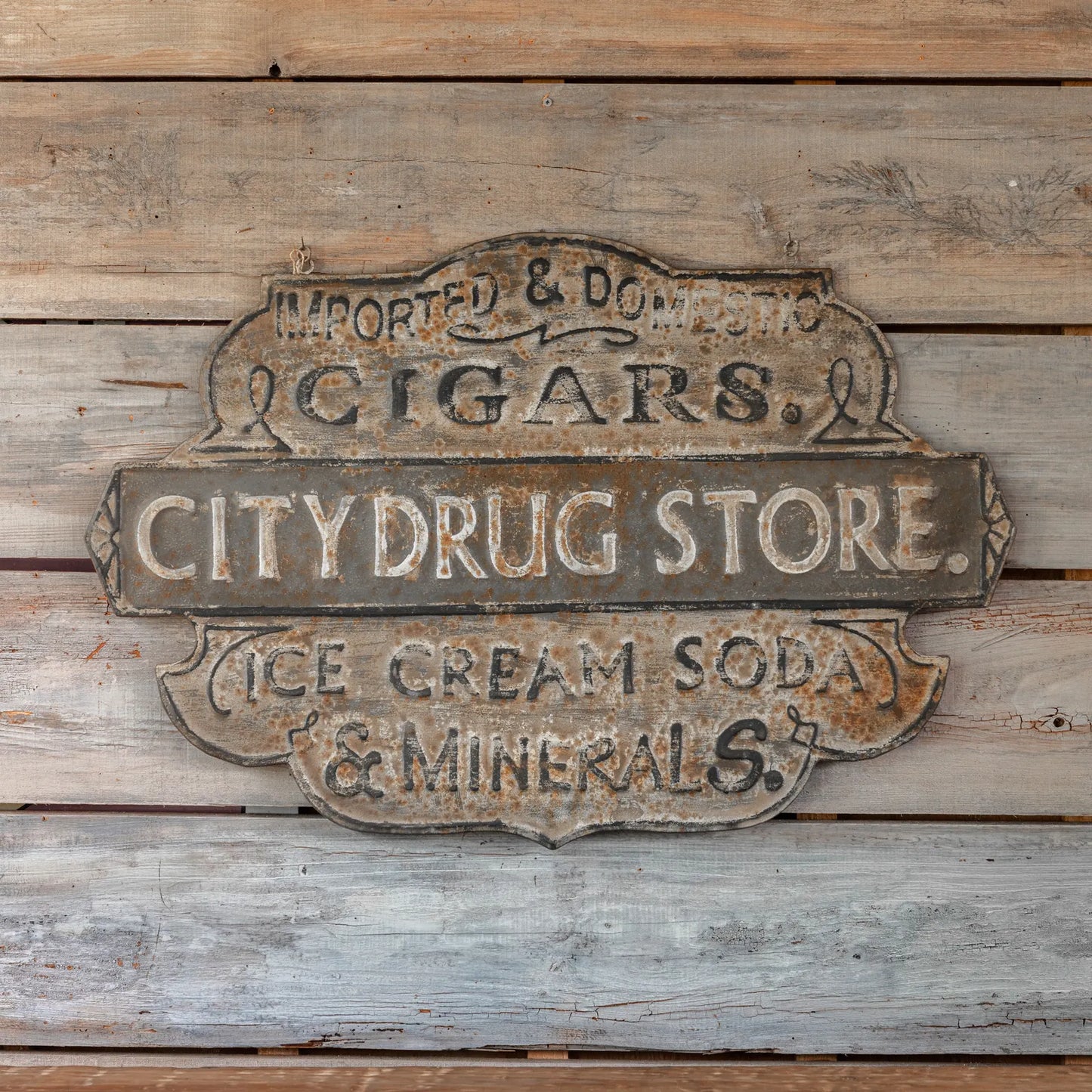 EMBOSSED METAL DRUG STORE SIGN