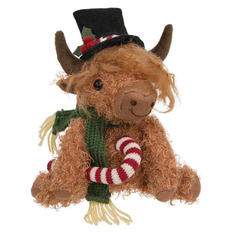 SITTING HIGHLAND COW W/ CANDY CANE